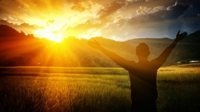 10185-back-view-man-praising-god-arms-wide-at-sunri